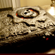 Illustration for article titled Someones Dragon Collection Melted on this Gears of War Xbox 360